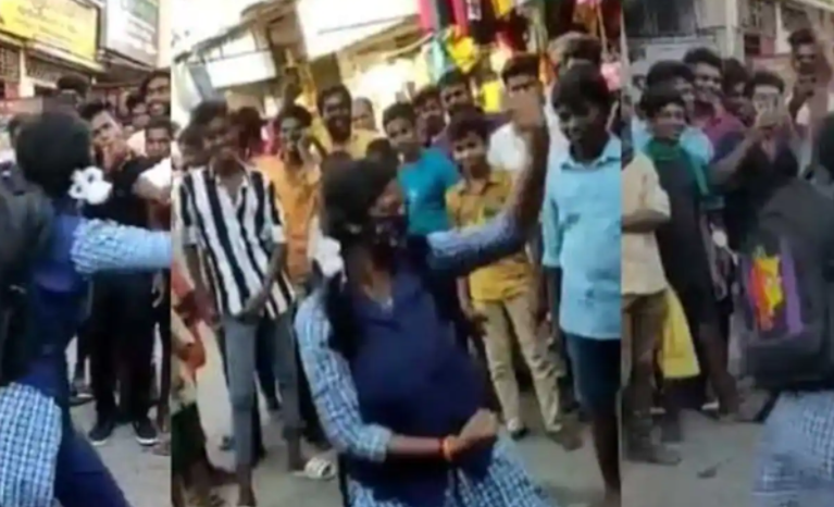 “நடுரோட்டில் குத்தாட்டம்” அரசு பள்ளி மாணவியின் செயல்…. வைரலாகும் காணொளி….!!