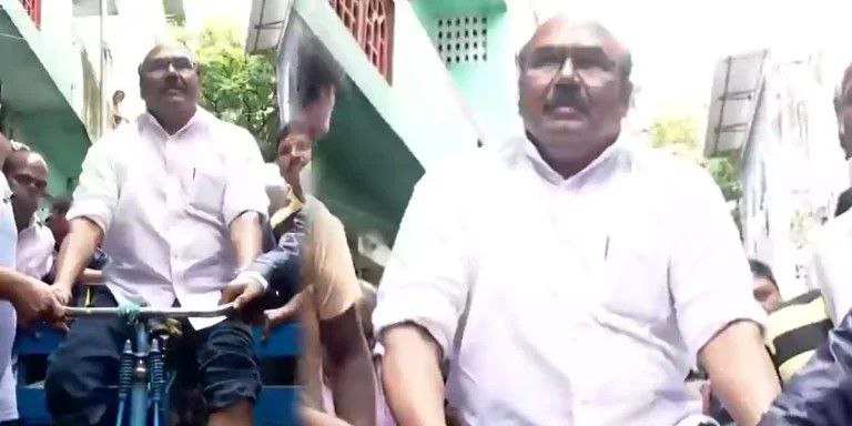 சுற்றிலும் தண்ணீர்.. அதிரடியாக களத்தில் இறங்கிய அதிமுக டி.ஜெ… மக்களுக்காக சைக்கிளில் சென்று உணவு விநியோகம்… வீடியோ வைரல்..!!!