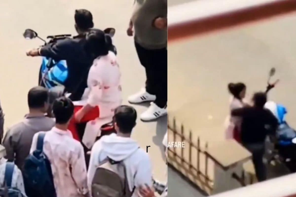 நடுரோட்டில் சரமாரியாக தாக்கிக்கொண்ட ஜோடி…. கடைசியில் நடந்த ட்விஸ்ட்…. அதிரிச்சி வீடியோ…!!!