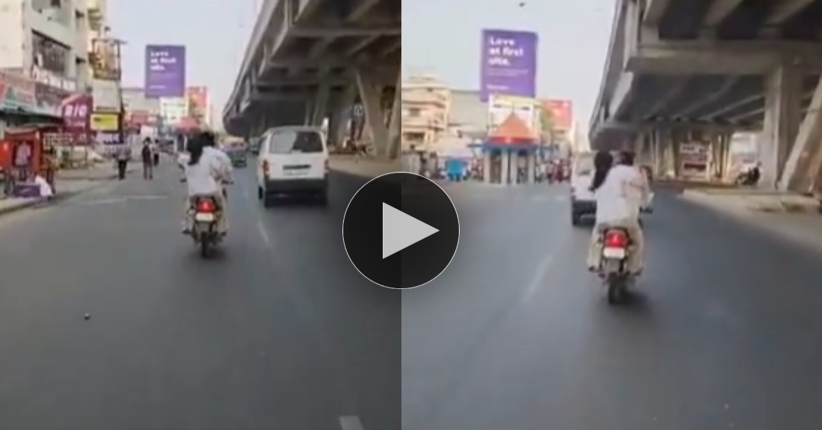 ஐயோ கடவுளே…!!  “பைக்கில் பயணித்த இளைஞனை மீண்டும் மீண்டும் செருப்பால் அடித்த பெண்”…  கலங்கவைத்த வைரல் வீடியோ..!!