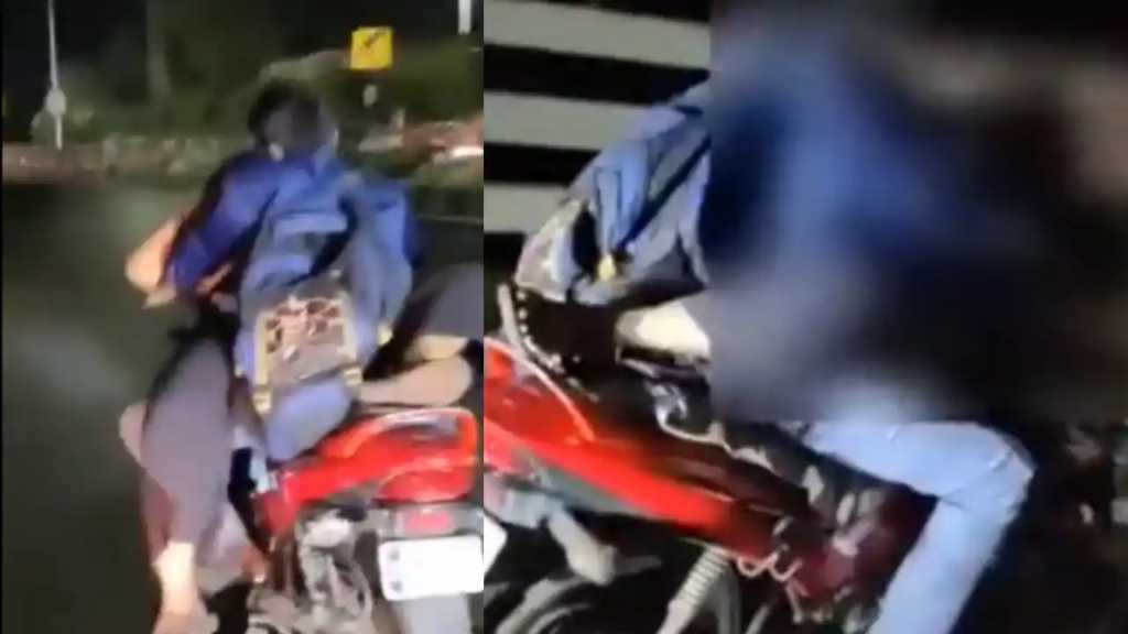 “நடு ரோட்டில் பைக்கில் காதலன் மடியில் அமர்ந்து கொண்டு”… அத்து மீறிய காதல் ஜோடி… முகம் சுளிக்க வைக்கும் வீடியோ..!!!