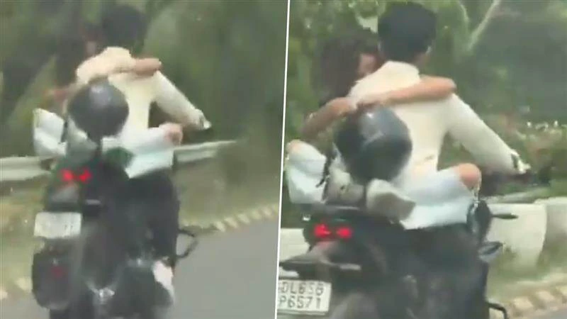 நடுரோட்டில செய்யுற காரியமா இது?… காதலனை கட்டி அணைத்துக் கொண்டு… ரூ. 53,500 அபராதம் விதித்த போலீஸ்… வைரலாகும் வீடியோ…!!!