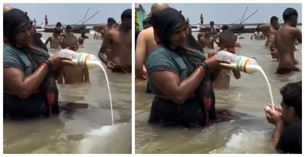 “கங்கை அன்னை யாரையும் பசியுடன் இருக்க விடமாட்டாள்”…. பாட்டிலில் இருந்து விழுந்த பால்… தீர்த்தம் என்று நினைத்து குடித்த வாலிபர்… வைரலாகும் வீடியோ…!!!