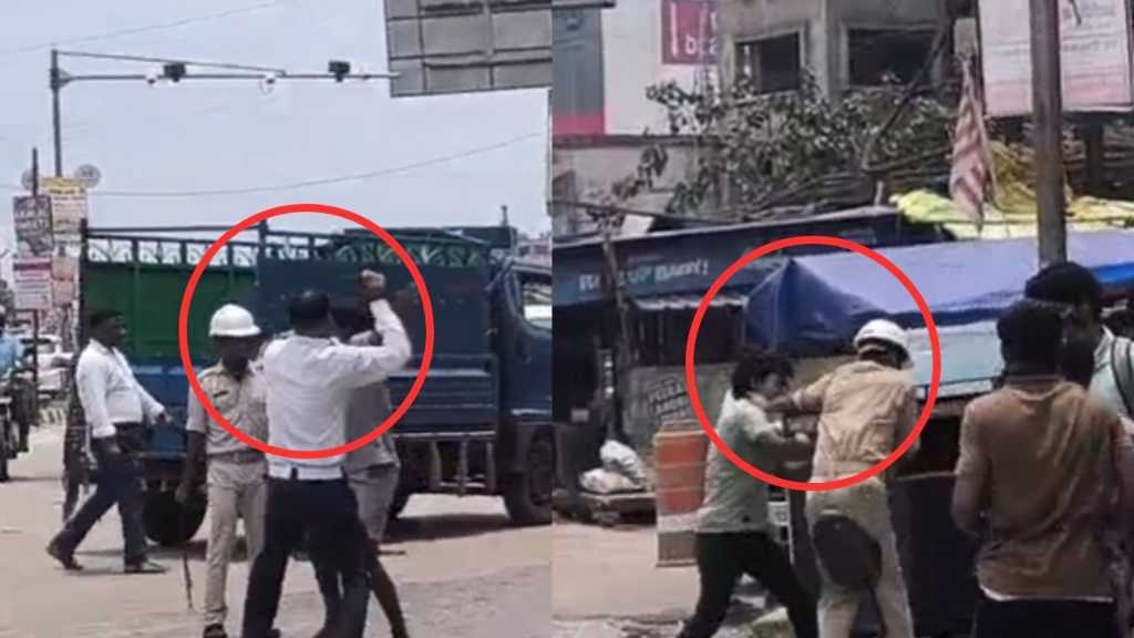 “பணியில் இருந்த போலீஸ்காரரை கல்லால் அடித்த ஆட்டோ ஓட்டுனர்”… நடு ரோட்டில் பயங்கர மோதல்…. வைரலாகும் அதிர்ச்சி வீடியோ…!!!