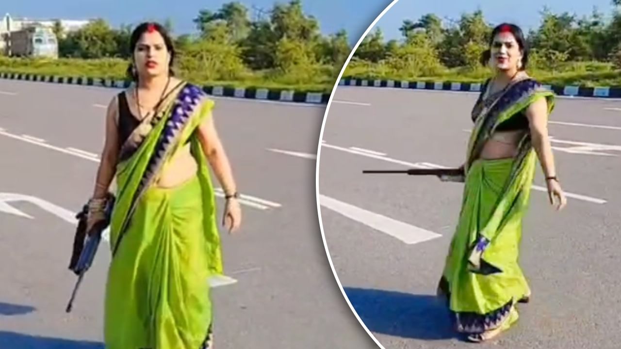 நடுரோட்டில் பந்தா கட்டிய பெண்…! “அதுவும் கையில் துப்பாக்கியுடன்”… கெத்து காட்டுற இடமா இது… தலைக்கேறிய ரீல்ஸ் வெறி.. வைரலாகும் வீடியோ…!!!!