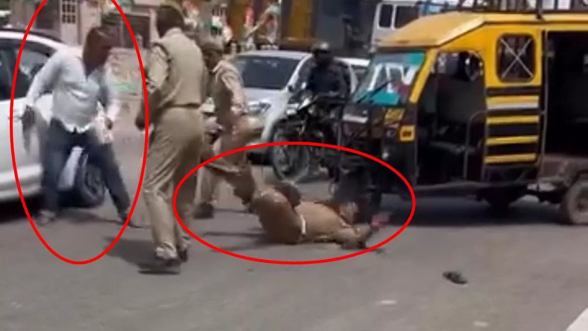 “பட்டப்பகலில் நடு ரோட்டில் போலீஸ்காரர்களை சரமாரியாக தாக்கிய ஆட்டோ ஓட்டுநர்”… எவ்வளவு தடுத்தும் முடியல… நடந்தது என்ன..? வீடியோ வெளியாகி பரபரப்பு..!!!