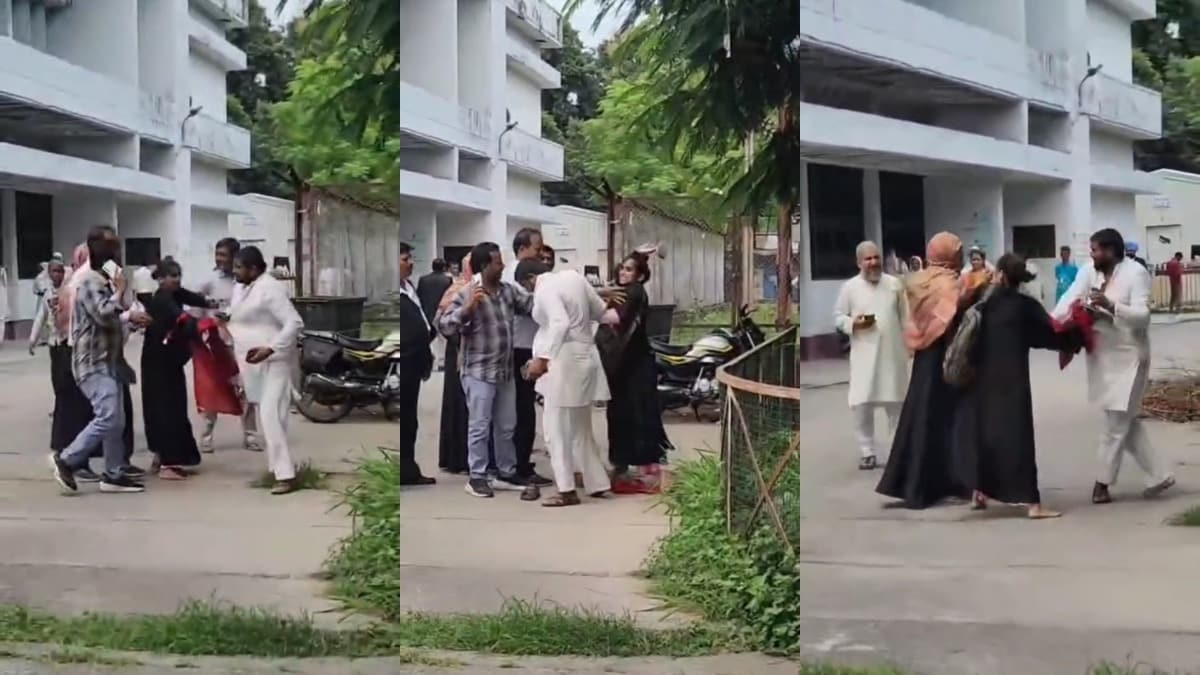 அடேய்..! “எவ்வளவு தைரியம் தான் இப்படி பண்ணுவ”.. கோர்ட்டுக்கு வெளியே கணவனை செருப்பால் அடித்த மனைவி… ஏன் தெரியுமா..? வைரலாகும் வீடியோ..!!!