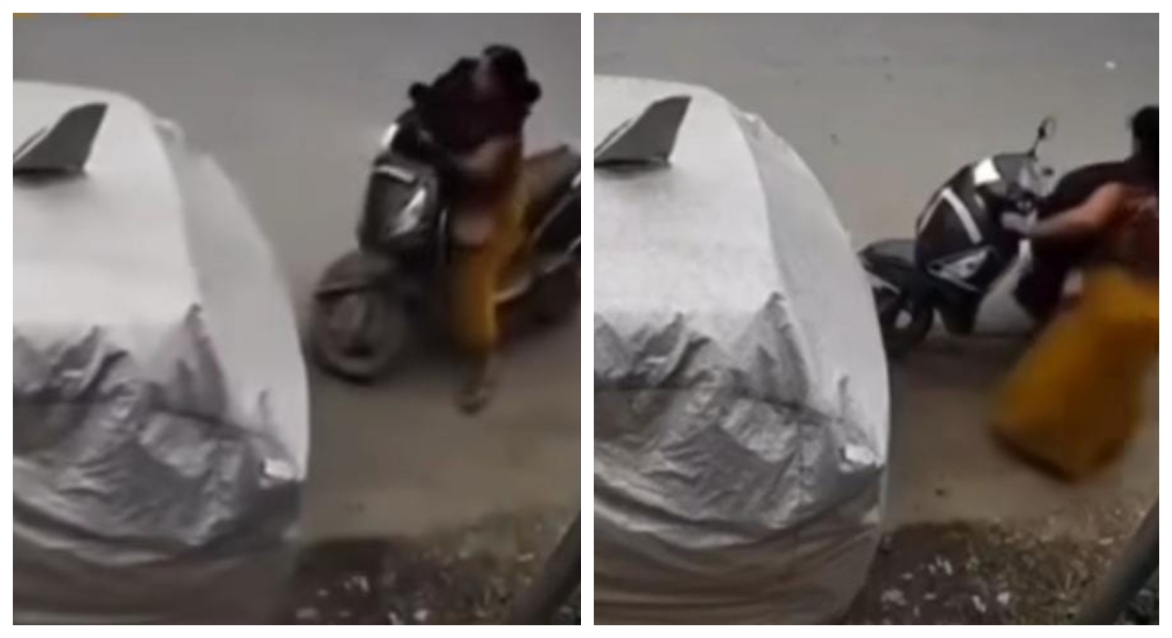 அடக்கொடுமையே… சாலையோரத்தில் நின்று கொண்டிருந்த கார்… பைக்கில் வேகமாக வந்து காரின் பின்னால் மோதிய பெண்… வைரலாகும் வீடியோ…!!!