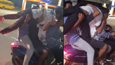ஒரு ஸ்கூட்டரில் 5 பேர்…. சாலையில் வித்தை காட்டிய கூட்டம்…. வைரலாகும் காணொளி….!!