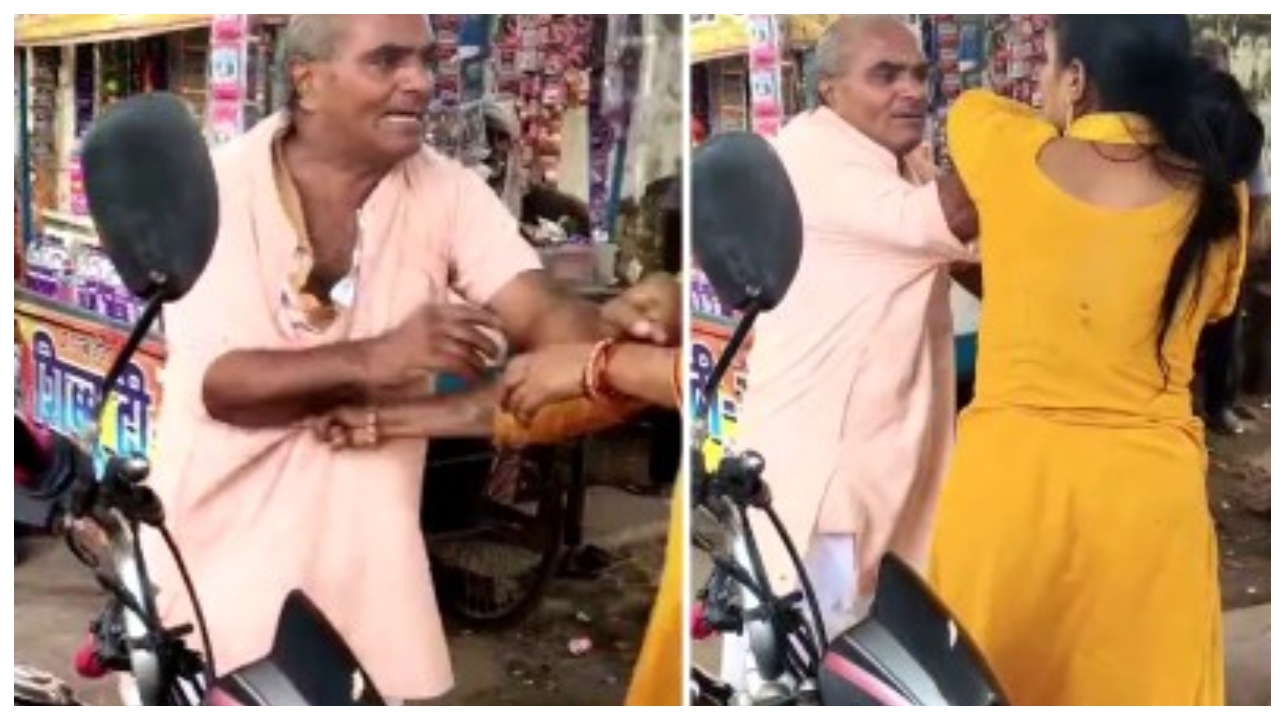 பட்டப் பகலில் நடந்த சண்டை…. பெண்ணை சரமாரியாக தாக்கிய கோவில் பூசாரி… யாரும் தடுக்கல… சுற்றி நின்று வேடிக்கை பார்த்த பொதுமக்கள்… வைரலாகும் வீடியோ…!!!