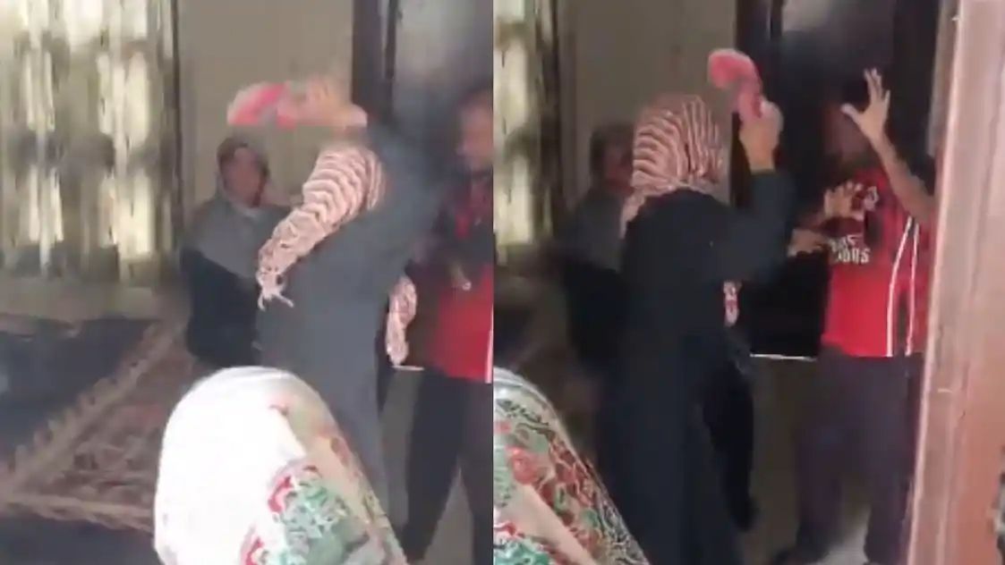 OYO-வில் கையும் களவுமாக சிக்கிய கணவன்…. செருப்பால் அடித்து வெளுத்த மனைவி…. வைரலாகும் வீடியோ….!!