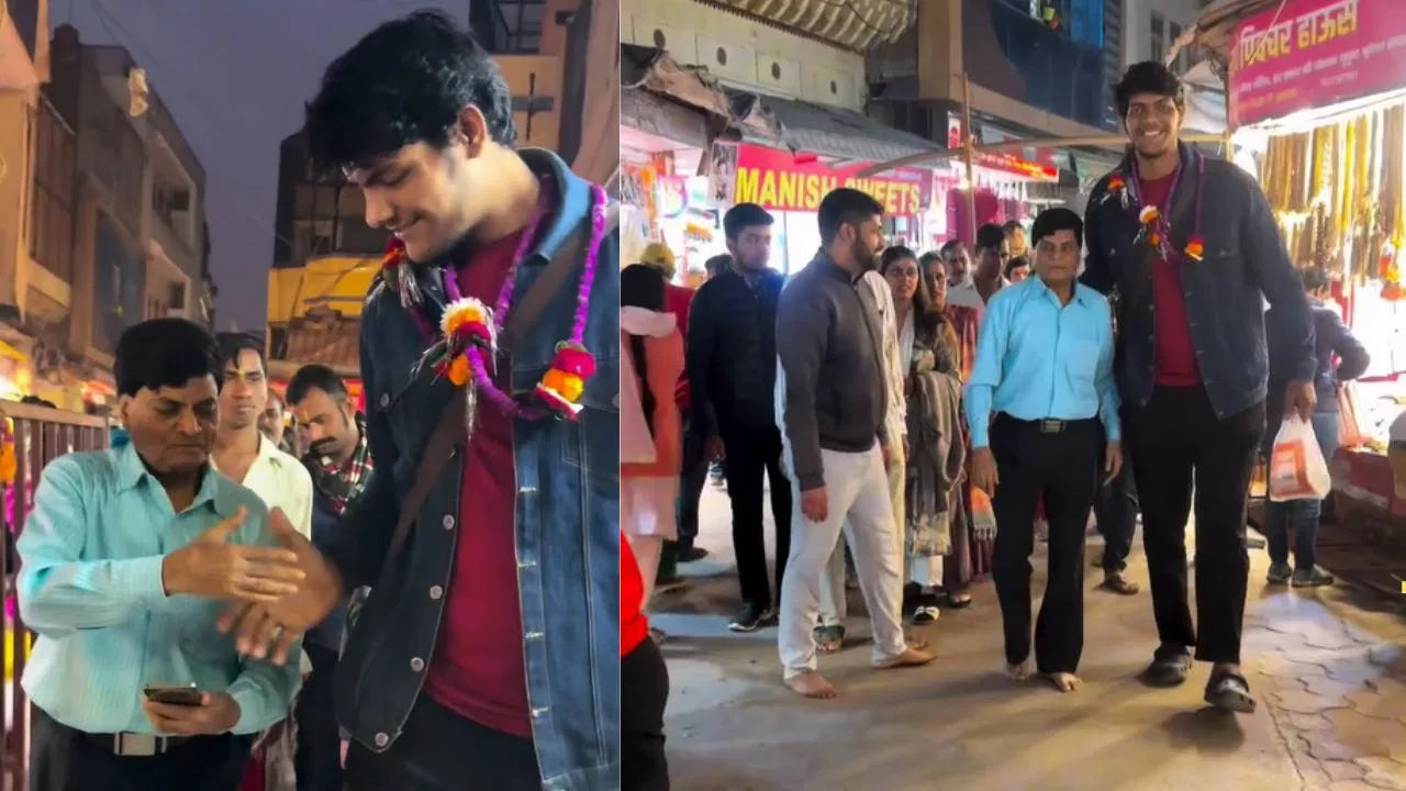 “கோபுரத்தை பாக்குற மாதிரி இருக்கு!”…கோயிலில் நின்ற அபூர்வ மனிதர்.. ஷாக்கில் பக்தர்கள்… வைரலாகும் வினோத வீடியோ..!!!