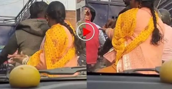 பொது இடத்தில் இப்படியா? கணவனுக்காக மனைவி செய்த காரியம்… ஒரே வீடியோவால் சமூகத்தில் வெடித்த மாபெரும் விவாதம்..!!!