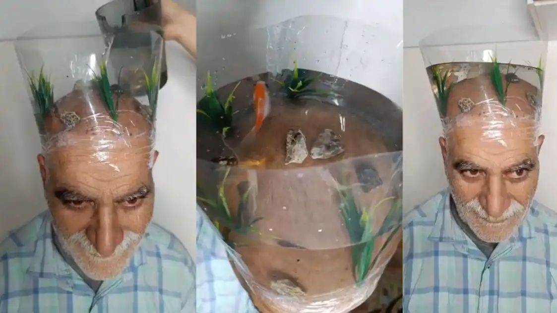 இவரின் திறமையை பாராட்டணும்..! தலையை மீன் தொட்டியாக மாற்றிய முதியவர்… அட செமப்பா.. இணையத்தை கலக்கும் வீடியோ…!!