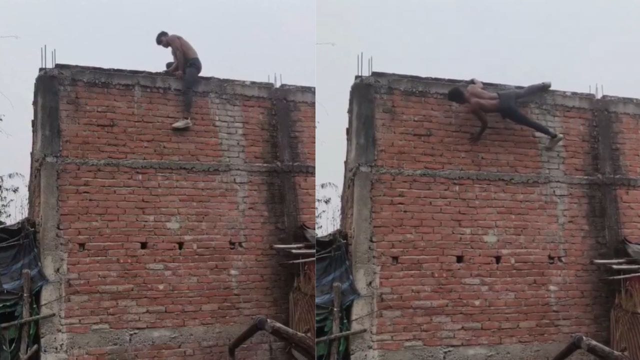 இதென்ன உடற்பயிற்சியா… நூலிழையில் உயிர்… அந்தரத்தில் தொங்கியபடி ‘புஷ்-அப்ஸ்’… மொட்டை மாடி விளிம்பில் இளைஞர் செய்த ‘பயங்கரம்’… வைரல் வீடியோ…!!!
