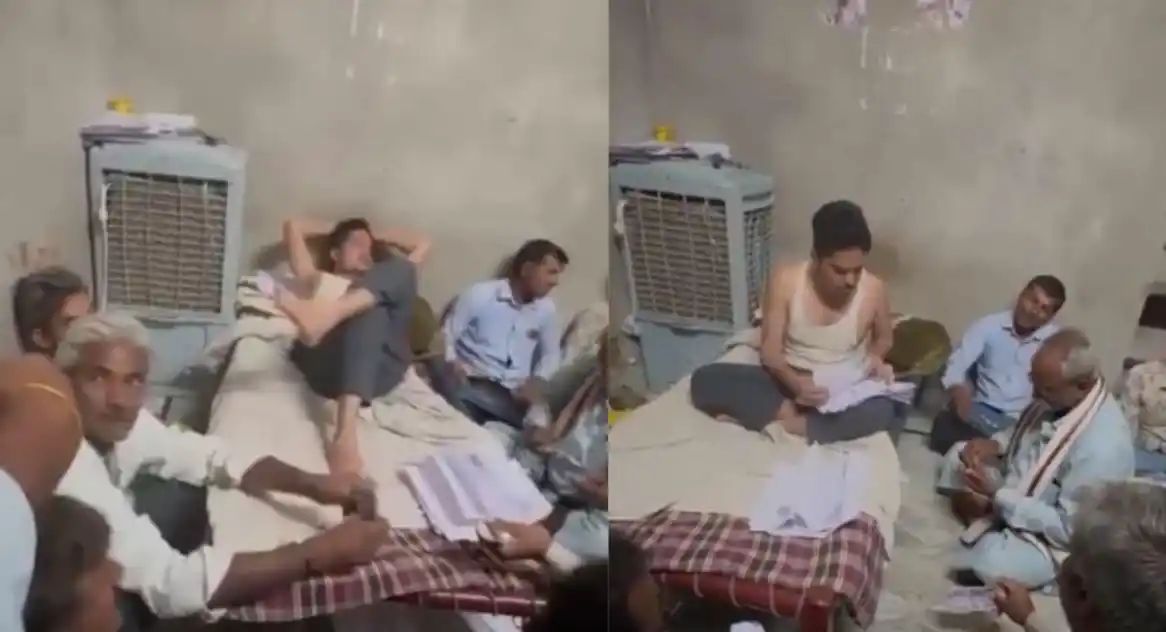 அது நன்கொடை… கட்டிலில் கால் நீட்டி படுத்துக்கொண்டு கிராம மக்களிடம் பணம் வசூலிக்கும் அரசு அலுவலர்… பரந்த நோட்டீஸ்… வைரல் வீடியோ…!!