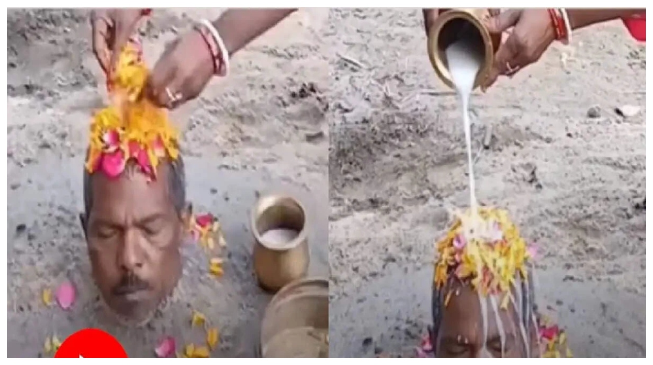 பக்தி முற்றியதா?… கணவனின் கழுத்து வரை மண்ணுக்குள் புதைத்து வினோத பூஜை – இணையத்தில் தீயாய் பரவும் வீடியோ…!!!