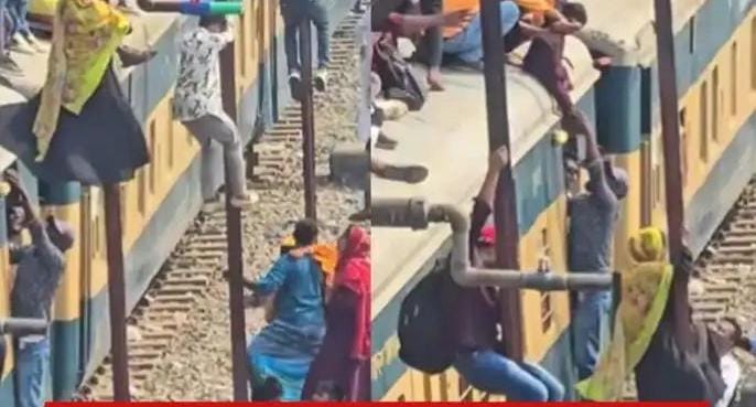 ஸ்பைடர்மேனுக்கே சவால் விடும் பயணிகள்… ரயிலின் கூரையில் இருந்து மின்கம்பம் வழியாகத் தொங்கி இறங்கி… வைரலாகும் பகீர் வீடியோ…!!!
