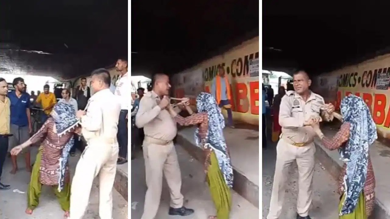 நடுரோடுன்னு கூட பாக்கலையே… சீருடையில் கை வைத்த பெண்… போலீஸ்காரரையே பொளந்து கட்டிய முக்காடு போட்ட பெண்ணால் பரபரப்பு… வீடியோ வைரலானதால் வெடித்த சர்ச்சை..!