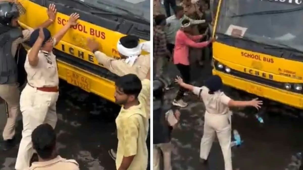 வெடித்த போராட்டம்…! தனி ஆளாக நின்னு ஒற்றை கையால் பேருந்தை தடுத்து நிறுத்திய பெண் போலீஸ் அதிகாரி… ஆண்கள் கூட்டத்தை பின்வாங்க வைத்த சிங்கப்பெண்… வைரலாகும் வீடியோ..!