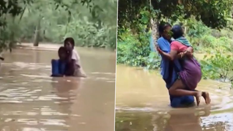 இடுப்பளவுக்கு வெள்ளம்..! “60 வயது மூதாட்டியை தோளில் சுமந்து அரை கிலோமீட்டர் தண்ணீரில் நடந்து சென்று உயிரை காத்த பெண்”… நீங்கதாங்க ரியல் ஹீரோ… நெகிழ்ச்சி வீடியோ..!