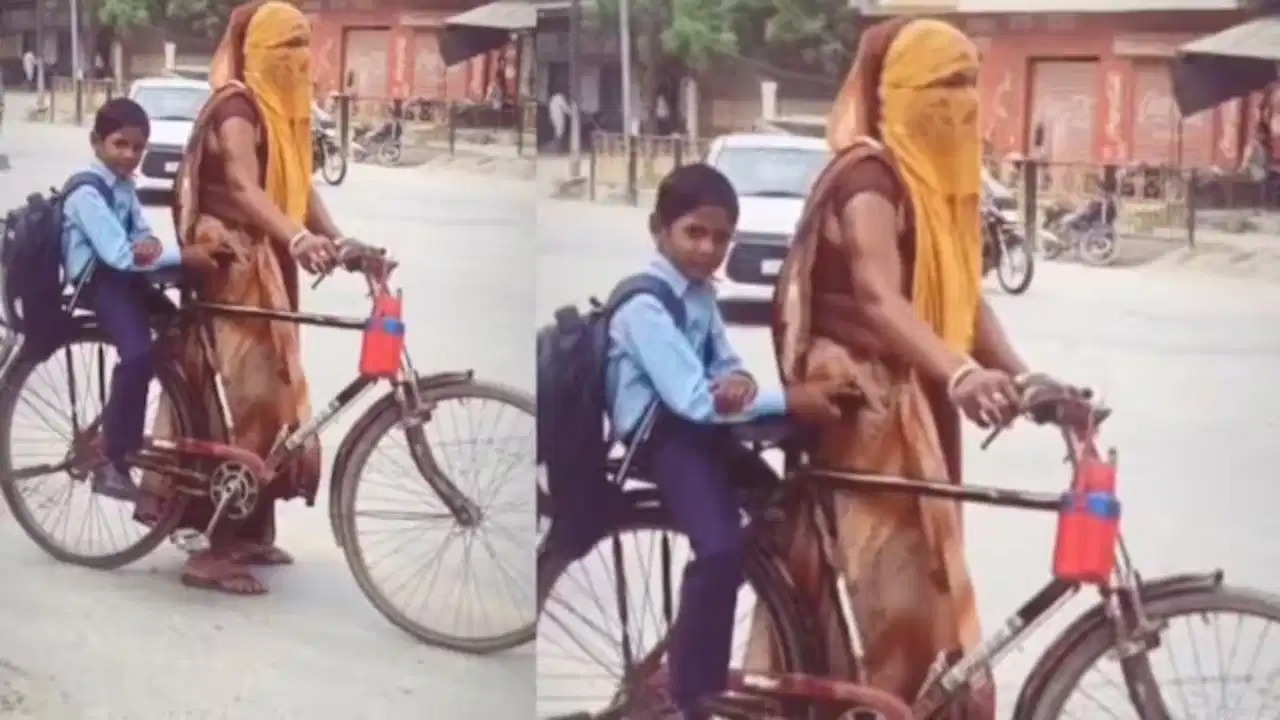 அம்மாவின் தியாகம் தான் பிள்ளைகளின் வெற்றி…! “சைக்கிளில் மகனை ஸ்கூலுக்கு கூட்டிட்டு போன தாய்”… ஆனா பின்னணியில் இப்படி ஒரு ஆழமான காரணம் இருக்கா…? கண்களை குளமாக்கும் காணொளி..!