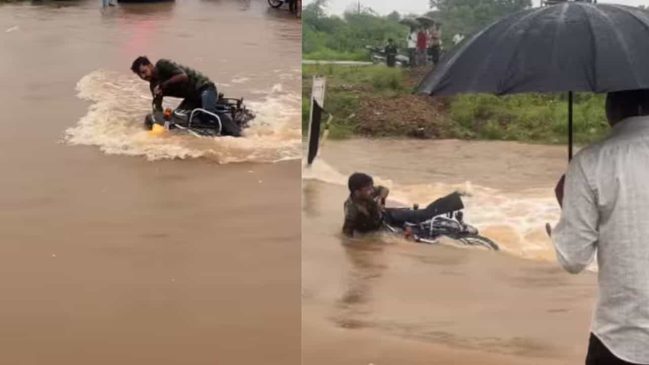 “எல்லாரும் வேணாம்னு தடுத்தும் கேட்காம….!” பெருக்கெடுத்து ஓடிய ஆற்றில் பைக்கை இறக்கிய வாலிபர்…. அடுத்த நொடியே நடந்த கொடூரம்…. பதறவைக்கும் வீடியோ….!!